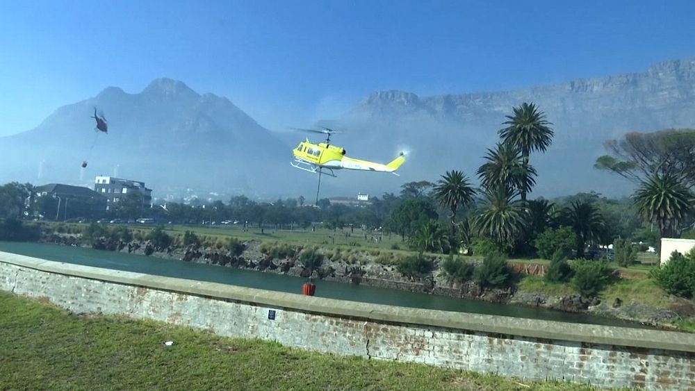 Crews work to extinguish wildfire on Table Mountain - NewsOpener Crews work to extinguish wildfire on Table Mountain