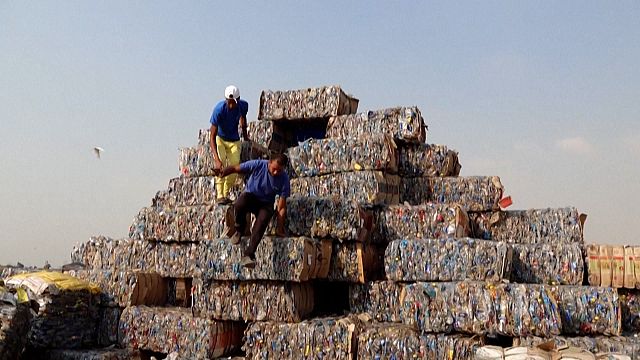 Volunteers build a "pyramid of waste" in Egypt.