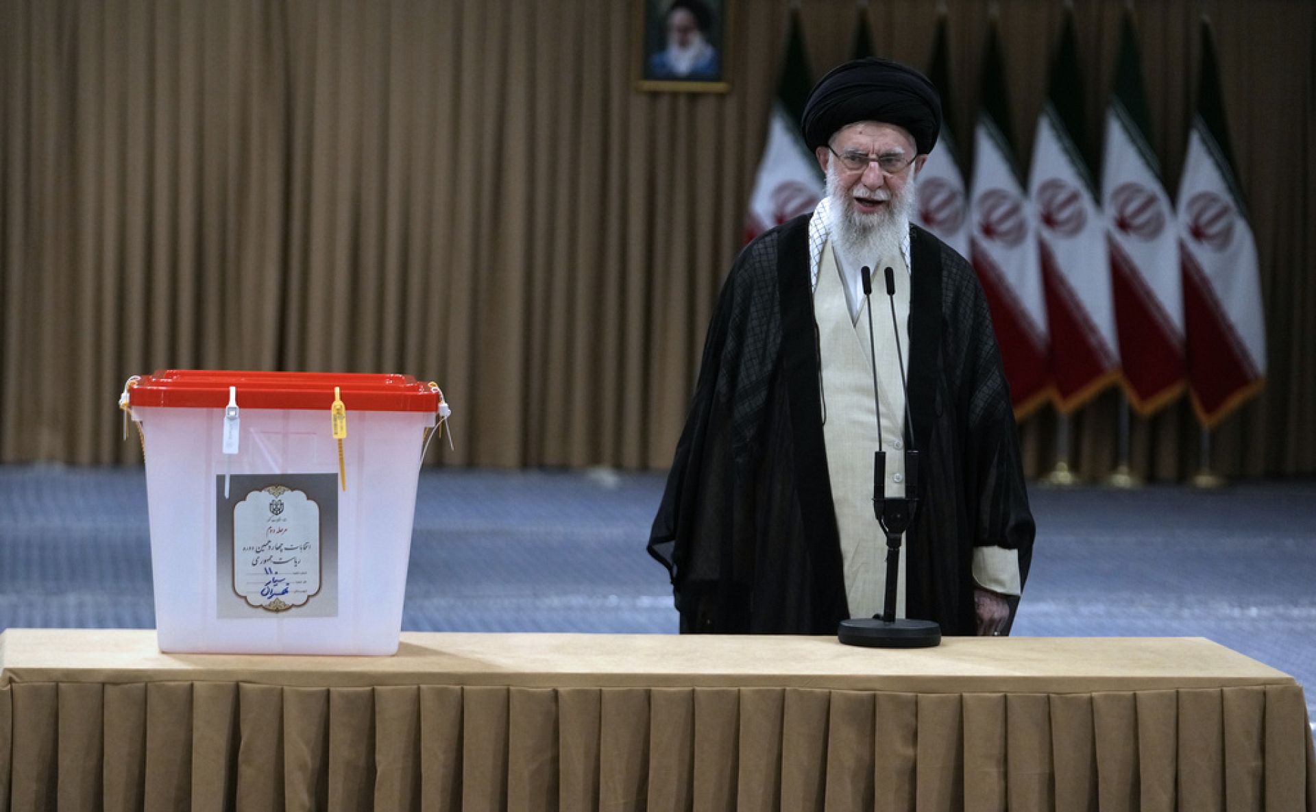 Iranians Choose Between Hardliner And Reformist In Presidential