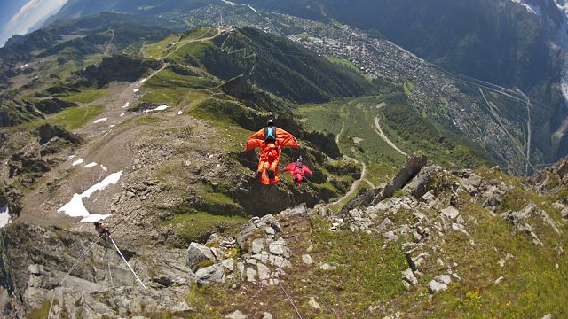 Austrian pilot breaks world's longest wingsuit flight records thumbnail