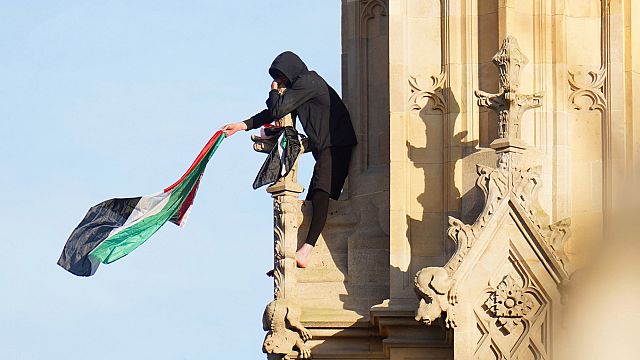 Man descends Tall Ben tower after climbing with Palestinian flag thumbnail