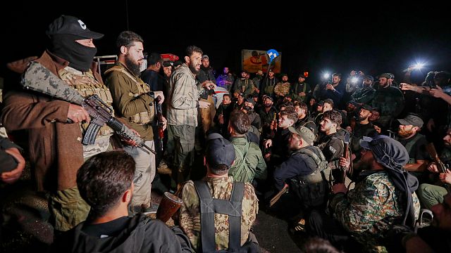 Syrian security forces and Druze gunman deploy in a Damascus suburb thumbnail