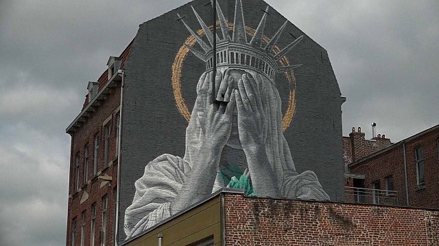 Giant mural in France critiques Trump's immigration policies