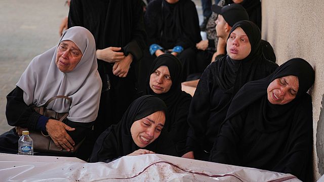 Palestinians mourn the 11 victims of an attack in Khan Younis thumbnail