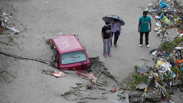 Flash floods and landslide kill dozens in Indian-controlled Kashmir