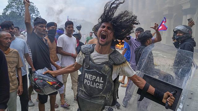 Nepal PM resigns as protesters torch politicians’ homes