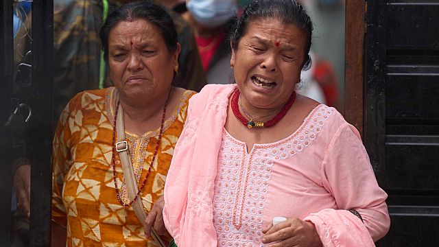 Families hold vigil in Nepal as death toll from protests rises