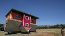 Roof down, floor up: South Africa's 'uʍop ǝpᴉsd∩' house attracts visitors