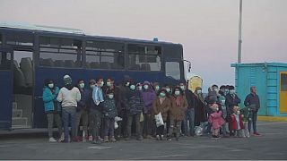 New migrants ferried from Greek island