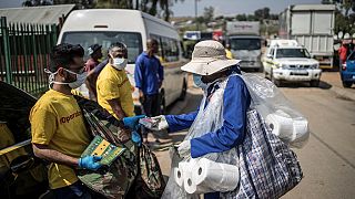 S. Africa: volunteers hand out soaps to curtail spread of COVID-19