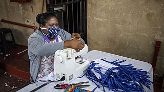 S.A: sewing shop shifts to making reusable masks for locals
