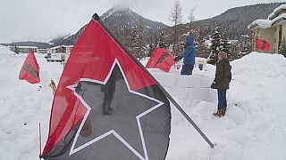 Big freeze fails to deter protesters at Davos