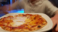 Two-year-old cancer patient inundated with pizza after window sign goes viral