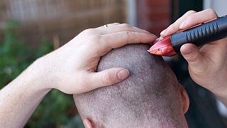 George Bush Senior shaves head in support of Leukaemia