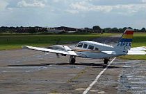 Passenger miraculously lands light aircraft after pilot falls ill at controls