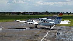 Passenger miraculously lands light aircraft after pilot falls ill at controls