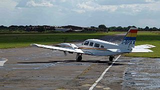 Passenger miraculously lands light aircraft after pilot falls ill at controls