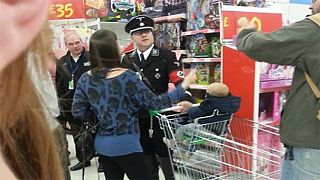 Man in full Nazi uniform upsets UK shoppers