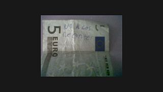 Message in a banknote for angry Spaniards