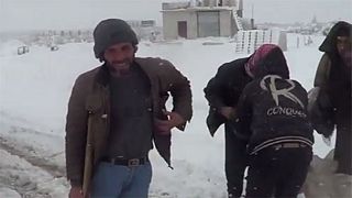 Two children freeze to death in Syria as snow storms sweep across Middle East