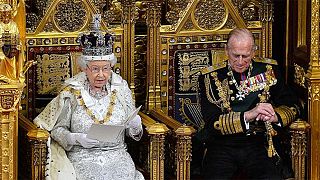 Britain's Queen Elizabeth goes nuts over nibbles at Buckingham Palace