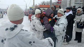 Russian LGBT activist arrested for waving a rainbow flag at Olympic torch relay