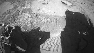 Watch: NASA's Curiosity drives on after crossing Martian dune