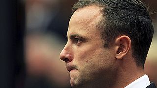 Oscar Pistorius repeats not guilty plea on first morning of Reeva Steenkamp murder trial