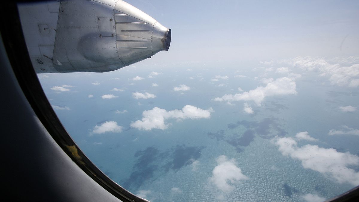As it happened: Malaysia's flight mystery remains as searches extended to Malacca Strait