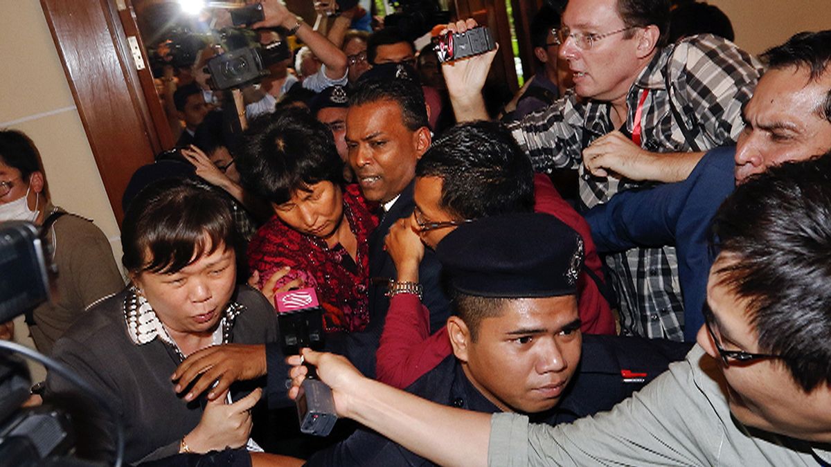 Missing flight MH370: grieving families receive first compensation payouts