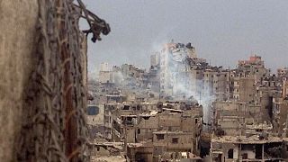 Homs in ruins as Syrian rebels leave
