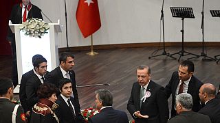 Turkey's Erdogan heckles critic, storms out of ceremony - Video