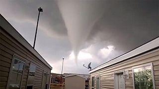 Watch: Duo film their escape as terrifying twister hits caravan park