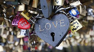 Heavy heart? Paris bridge panel falls under weight of 'love locks'