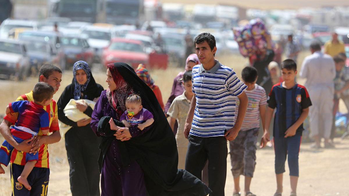 اكثر من 500 الف شخص فروا من الموصل والمسلحون يحكمون سيطرتهم عليها