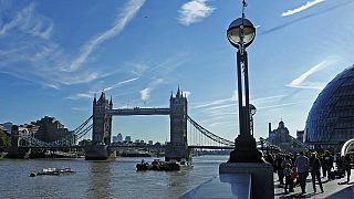 Watch: Runner jumps into River Thames to save bridge jumper