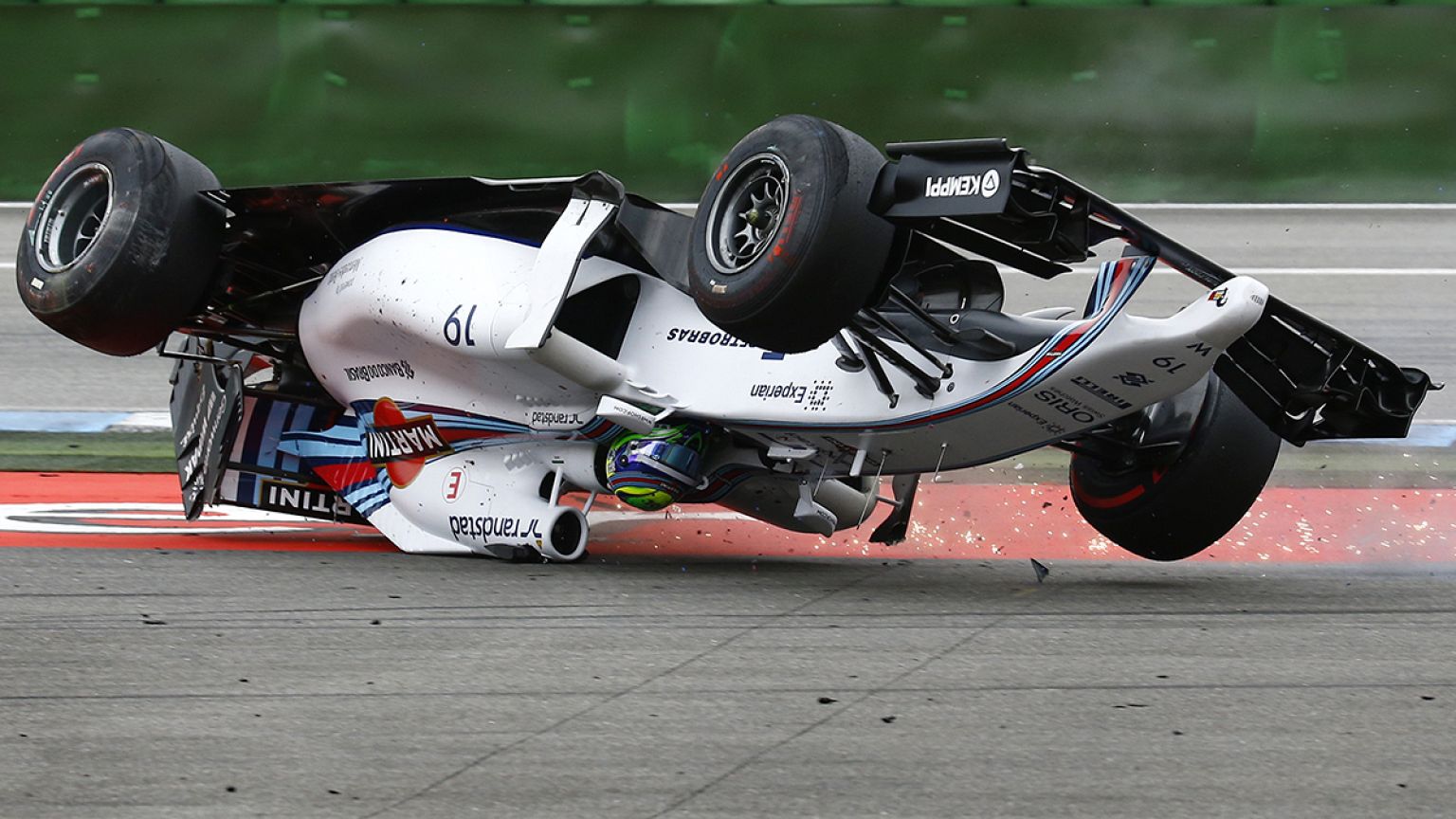 F1 Germany: Massa flips in first-corner crash