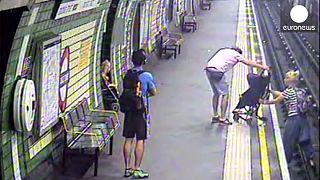 Watch: child rescued from London track 'seconds before train arrives'