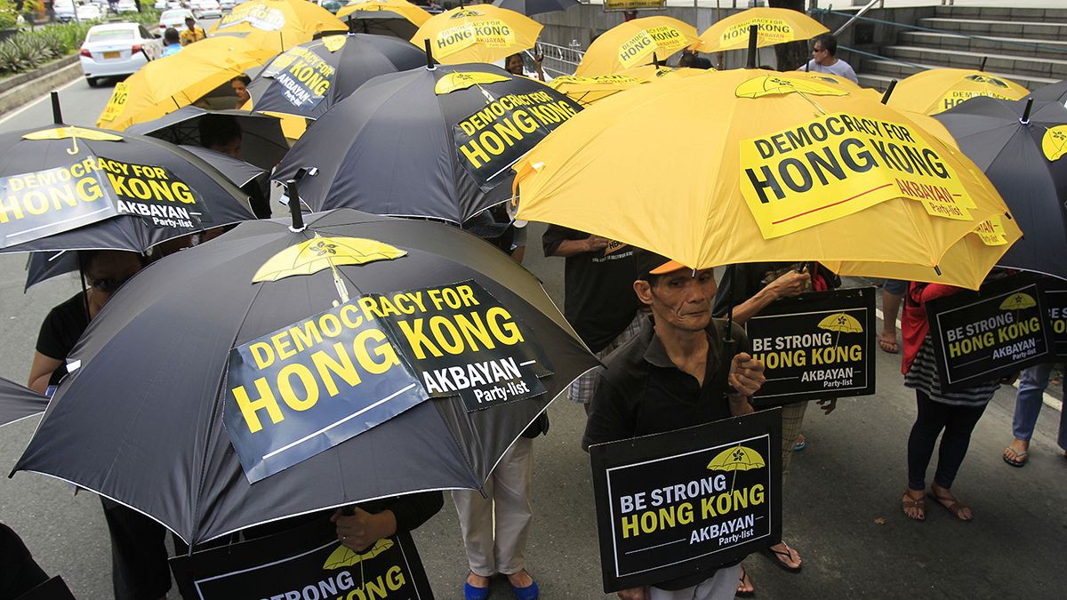 Hong Kong sous les parapluies