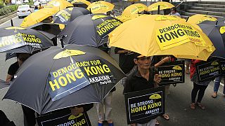 Hong Kong sous les parapluies