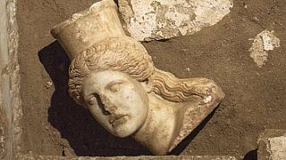 Greek archaeologists unearth head of sphinx in Macedonian tomb