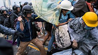 Police and protesters clash at Hong Kong government HQ