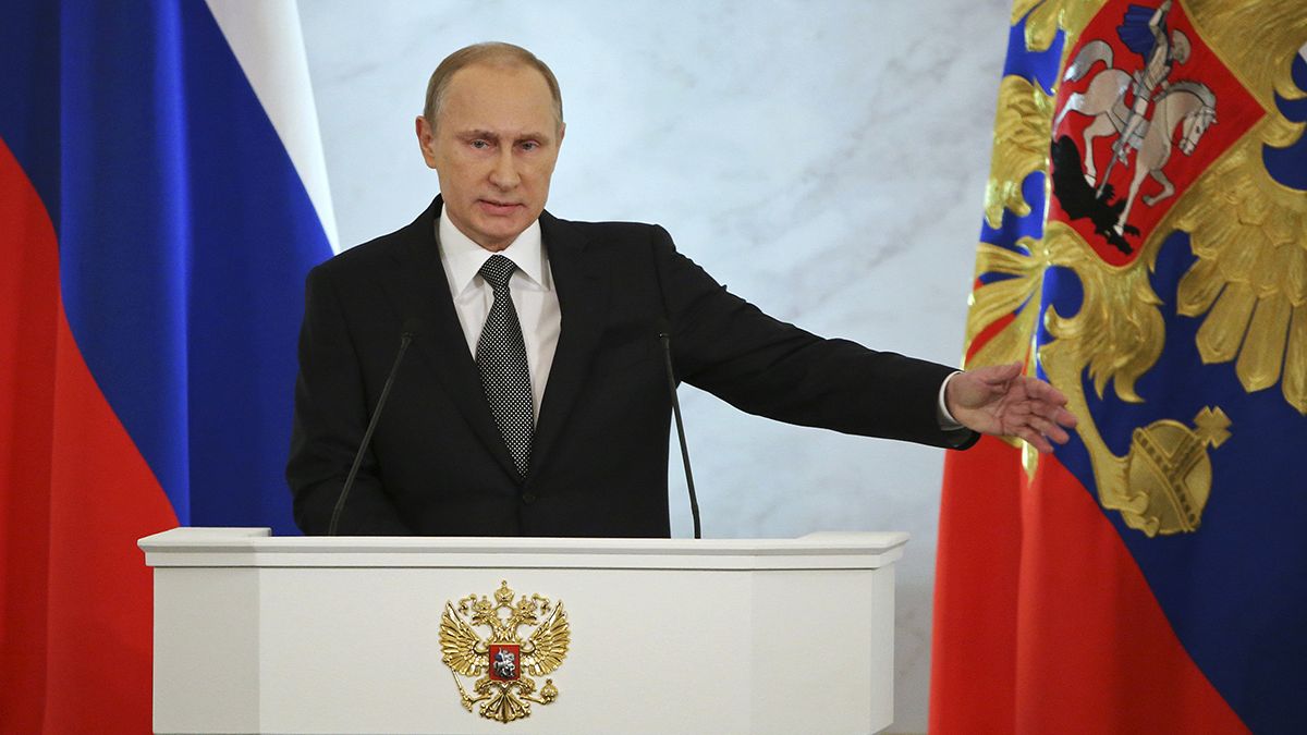 Putin's annual parliamentary address promises Russia will overcome all challenges