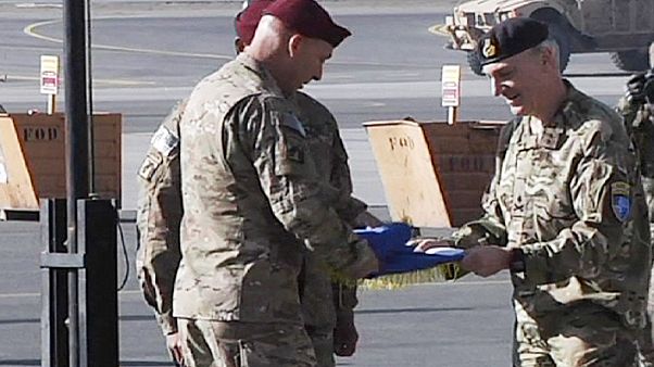 Handover ceremony marks end of US and NATO combat mission in Afghanistan Handover ceremony marks end of US and NATO combat mission in Afghanistan