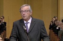 EU's Juncker sworn in amid ongoing tax row