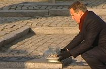 Cameron honours victims at Auschwitz death camp