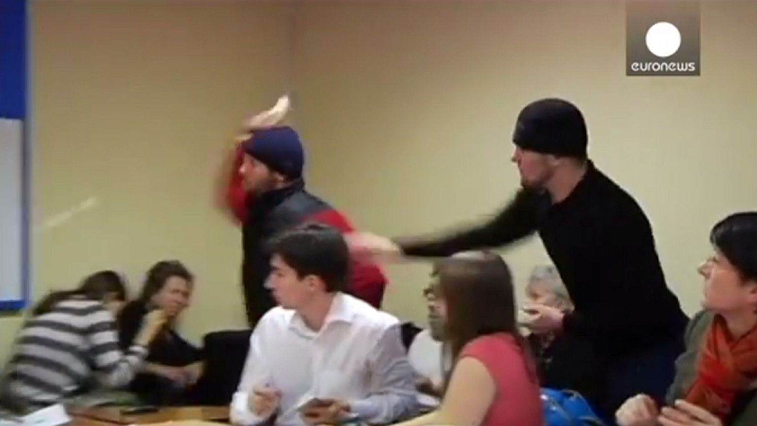 [WATCH] Human rights activists pelted with eggs over Chechnya claims