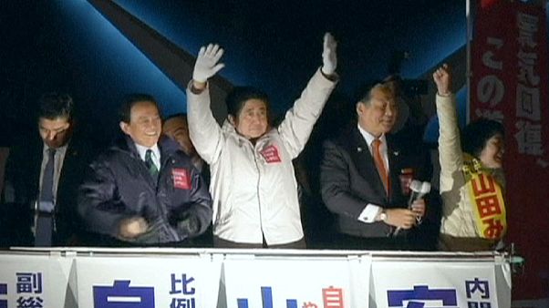 Japanese voters go to polls with Prime Minister Shinzo Abe likely to hold onto power Japanese voters go to polls with Prime Minister Shinzo Abe likely to hold onto power