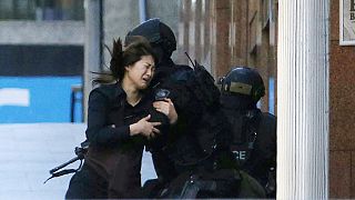 Sydney siege: Five hostages run from cafe