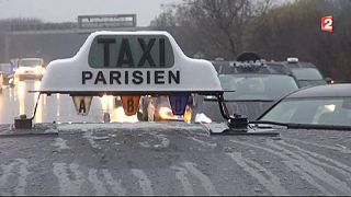 Parts of Paris crawl to a halt as taxi drivers protest against UberPOP